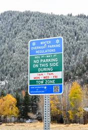 Sign stating "no parking  on this side"